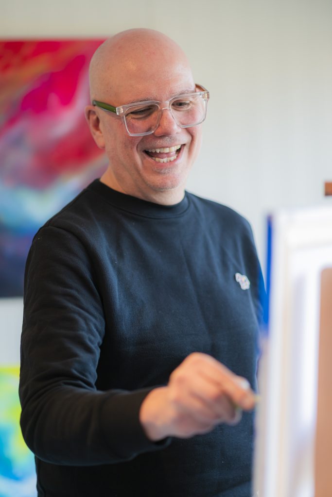 Andy Taylor Painting in the Art Haus studio