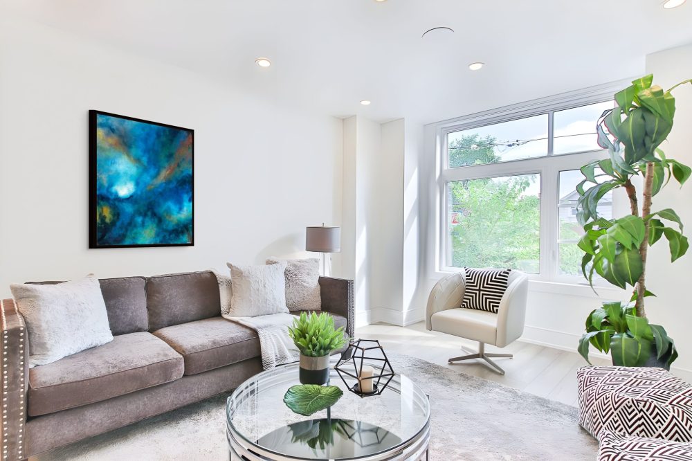Forest Alchemy abstract forest painting by Andy Taylor staged in a living room